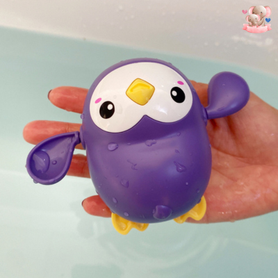Jouet-de-bain-pingouin-mauve