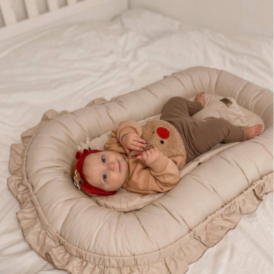 Pourquoi et quand utiliser un réducteur de lit bébé ?