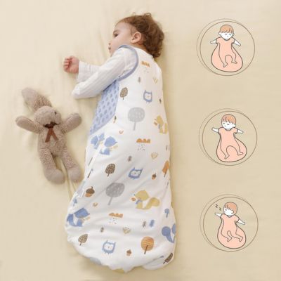 nid-d-ange-bebe-dans-son-lit