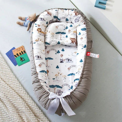 réducteur-de-lit-bébé-motifs-nature-animaux