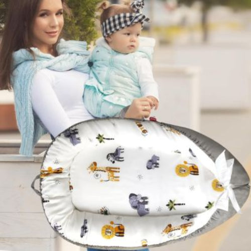 réducteur-de-lit-bebe-transportable